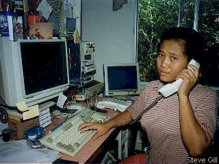 [Pic: Nengah at the computer] 
